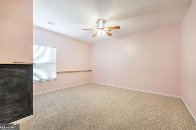 132 Hidden Creek Cir, Lizella, GA 31052 - empty room with ceiling fan and carpet