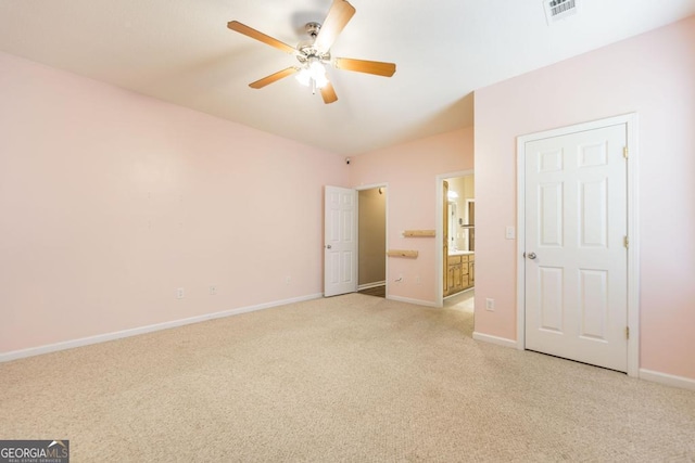 132 Hidden Creek Cir, Lizella, GA 31052 - unfurnished bedroom with light carpet, connected bathroom, and ceiling fan