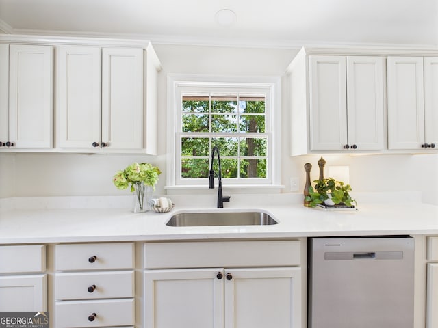 4630 Glenwood Dr, Macon, GA 31210 - kitchen featuring dishwasher, white cabinetry, and light countertops