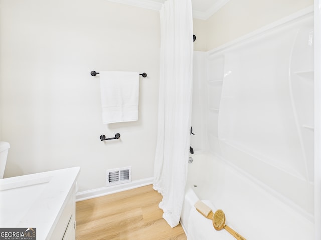 4630 Glenwood Dr, Macon, GA 31210 - full bathroom featuring shower / tub combo with curtain, wood finished floors, vanity, and ornamental molding
