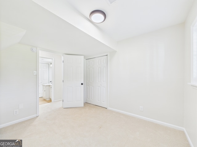 4630 Glenwood Dr, Macon, GA 31210 - unfurnished bedroom featuring carpet floors and a closet