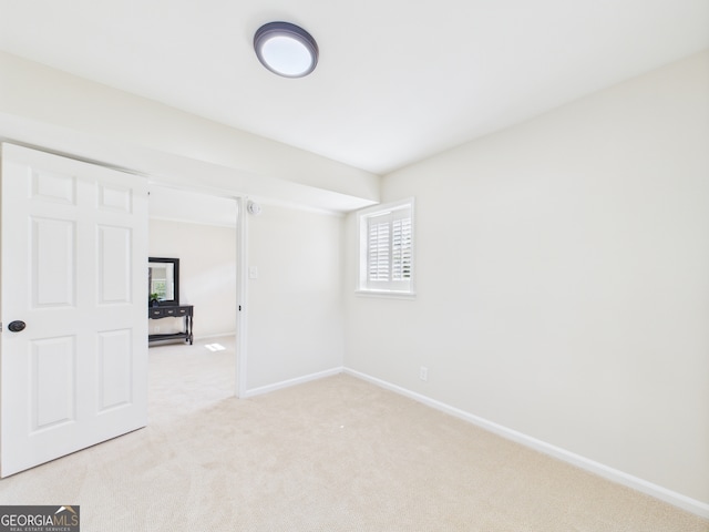 4630 Glenwood Dr, Macon, GA 31210 - unfurnished bedroom with light carpet and baseboards