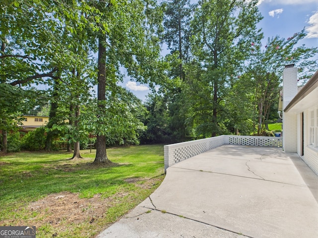 4630 Glenwood Dr, Macon, GA 31210 - view of grassy yard featuring a patio