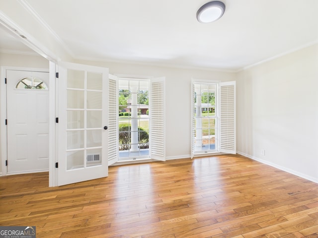 4630 Glenwood Dr, Macon, GA 31210 - unfurnished room featuring light wood-style flooring and crown molding