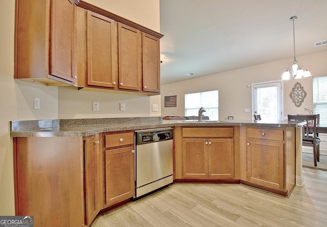 862 Crescent Ln, Griffin, GA 30224 - kitchen featuring dishwasher, a peninsula, light wood-type flooring, and brown cabinets