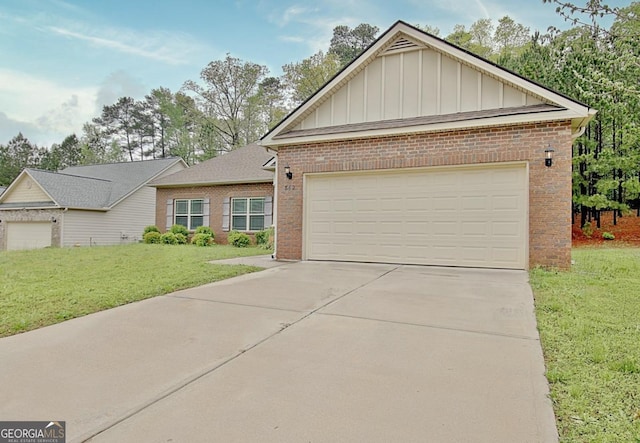 862 Crescent Ln, Griffin, GA 30224 - view of front of home featuring board and batten siding, brick siding, a front yard, concrete driveway, and an attached garage