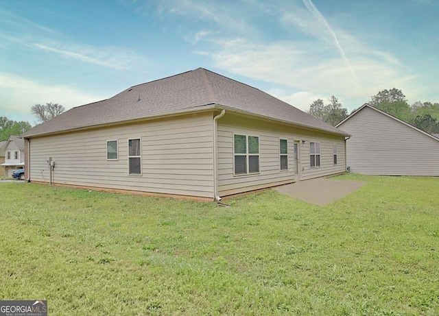 862 Crescent Ln, Griffin, GA 30224 - rear view of property with a yard and a patio