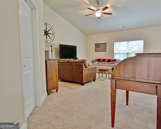 862 Crescent Ln, Griffin, GA 30224 - living area featuring light colored carpet, lofted ceiling, and a ceiling fan
