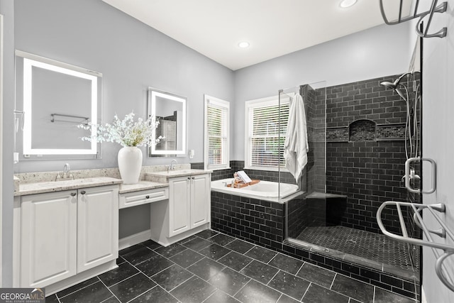 1065 Beacon Hill Xing, Alpharetta, GA 30005 - bathroom with double vanity, a garden tub, a shower stall, tile patterned flooring, and recessed lighting