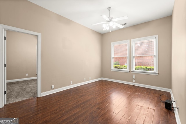 1065 Beacon Hill Xing, Alpharetta, GA 30005 - unfurnished room featuring dark wood-type flooring and a ceiling fan
