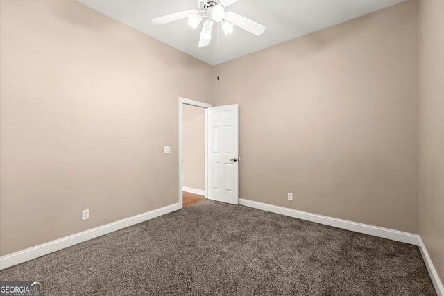 1065 Beacon Hill Xing, Alpharetta, GA 30005 - empty room with ceiling fan and dark colored carpet