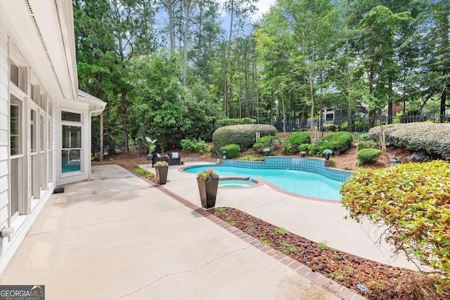 1065 Beacon Hill Xing, Alpharetta, GA 30005 - view of swimming pool featuring a patio area and a pool with connected hot tub