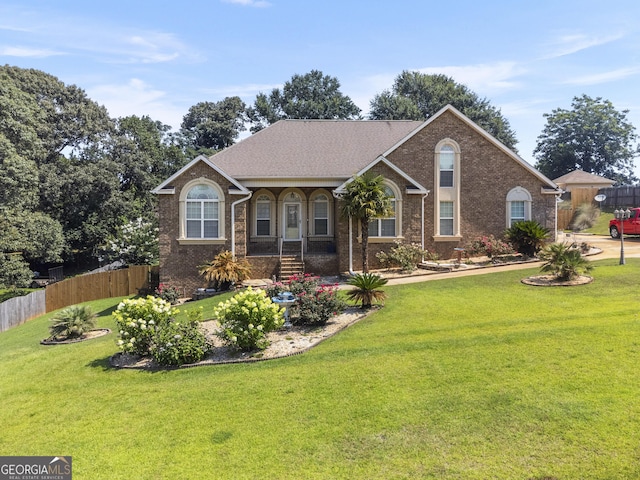 408 Dixieland Dr, Byron, GA 31008 - view of front of house featuring brick siding and a porch
