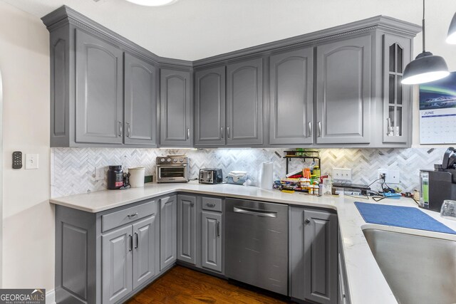 408 Dixieland Dr, Byron, GA 31008 - kitchen featuring stainless steel dishwasher, gray cabinetry, backsplash, and light countertops