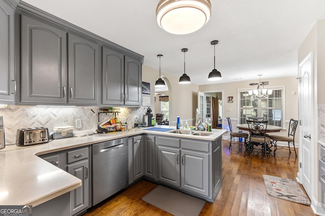 408 Dixieland Dr, Byron, GA 31008 - kitchen with gray cabinets, dishwasher, a peninsula, and healthy amount of natural light