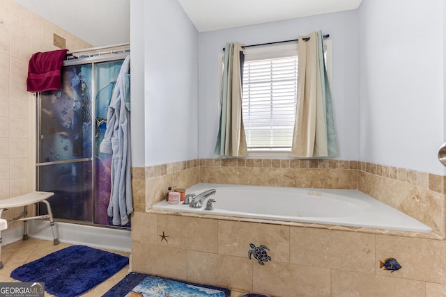 408 Dixieland Dr, Byron, GA 31008 - bathroom with a bath, a shower, and tile patterned floors