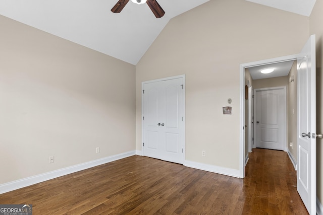 408 Dixieland Dr, Byron, GA 31008 - unfurnished bedroom featuring high vaulted ceiling, dark wood-style flooring, and ceiling fan