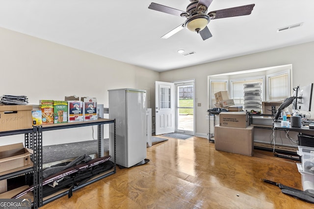 408 Dixieland Dr, Byron, GA 31008 - office area with ceiling fan and wood finished floors