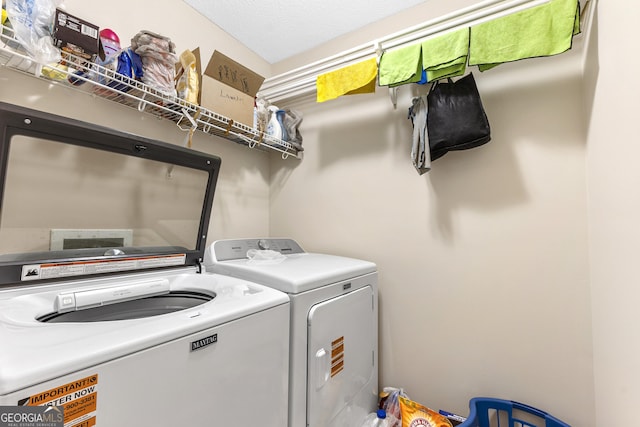 408 Dixieland Dr, Byron, GA 31008 - laundry area with washing machine and clothes dryer