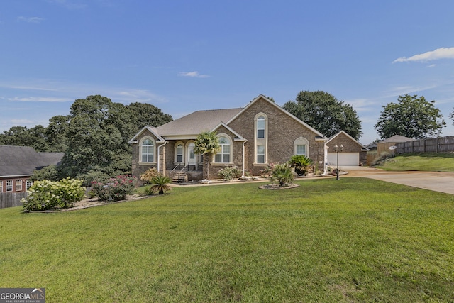 408 Dixieland Dr, Byron, GA 31008 - traditional-style home featuring brick siding and concrete driveway