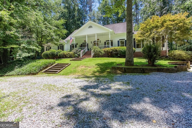 5491 Hiram Rd, Powder Springs, GA 30127 - view of front of home featuring a front lawn and covered porch