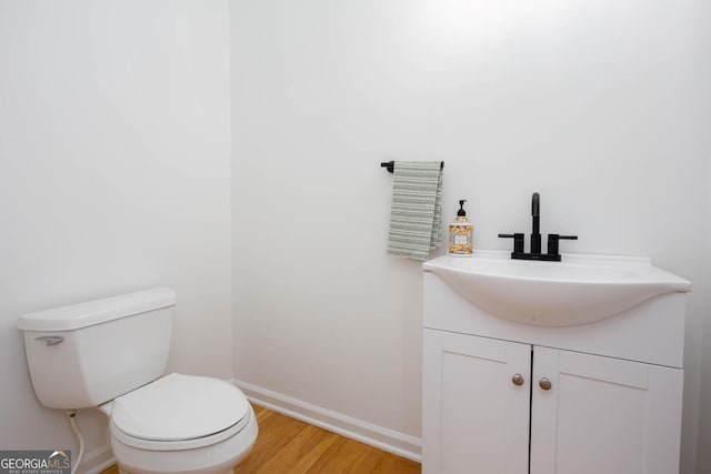 5491 Hiram Rd, Powder Springs, GA 30127 - bathroom featuring wood finished floors and vanity