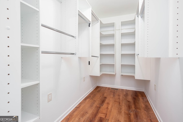 5491 Hiram Rd, Powder Springs, GA 30127 - spacious closet featuring wood finished floors
