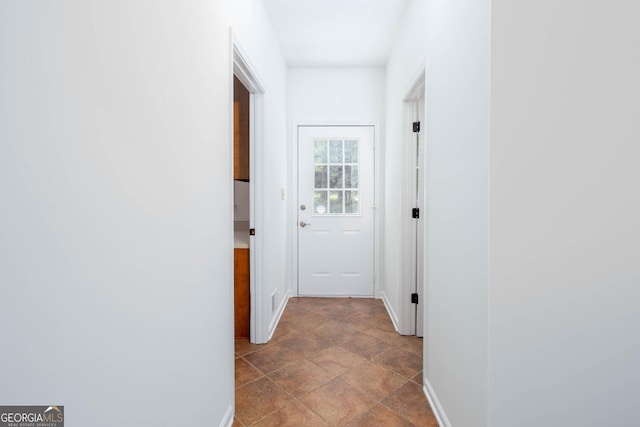 5491 Hiram Rd, Powder Springs, GA 30127 - hall featuring baseboards and stone finish flooring