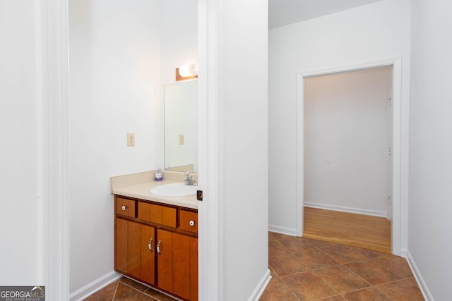 5491 Hiram Rd, Powder Springs, GA 30127 - bathroom with vanity and baseboards