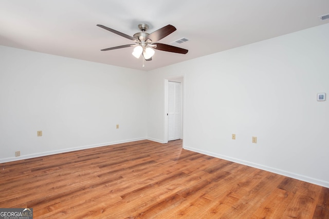 5491 Hiram Rd, Powder Springs, GA 30127 - spare room with light wood-style floors and ceiling fan