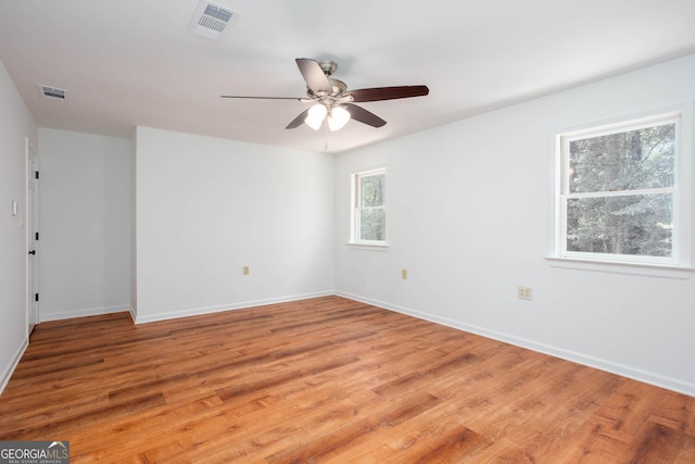 5491 Hiram Rd, Powder Springs, GA 30127 - unfurnished room with light wood-style floors and ceiling fan