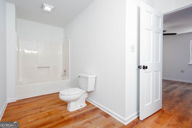 5491 Hiram Rd, Powder Springs, GA 30127 - bathroom featuring wood finished floors and bathtub / shower combination