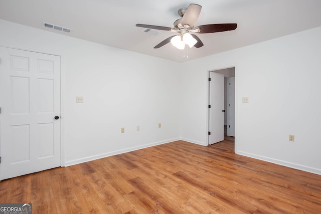 5491 Hiram Rd, Powder Springs, GA 30127 - empty room featuring light wood finished floors and a ceiling fan