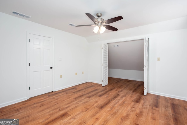 5491 Hiram Rd, Powder Springs, GA 30127 - unfurnished bedroom featuring light wood finished floors and a ceiling fan