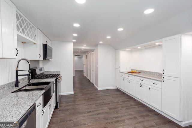 5491 Hiram Rd, Powder Springs, GA 30127 - kitchen with stainless steel appliances, dark wood-style flooring, white cabinets, recessed lighting, and light stone countertops