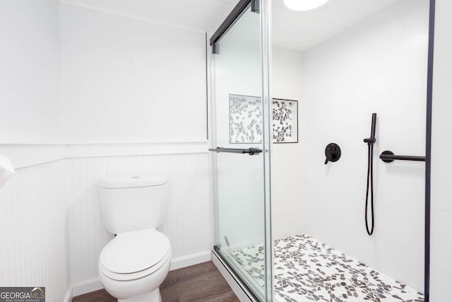 5491 Hiram Rd, Powder Springs, GA 30127 - full bath with wood finished floors, a stall shower, wainscoting, and baseboard heating