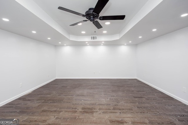 5491 Hiram Rd, Powder Springs, GA 30127 - unfurnished room with ceiling fan, a raised ceiling, wood finished floors, and recessed lighting