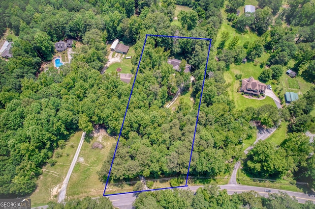 5491 Hiram Rd, Powder Springs, GA 30127 - aerial overview of property's location featuring property boundaries highlighted and a forest