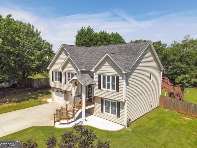 432 Nicole Ct, Winder, GA 30680 - split foyer home featuring a shingled roof, driveway, and a garage