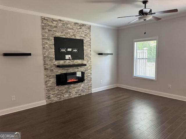 3891 Valley View Ct, Gainesville, GA 30501 - unfurnished living room featuring ceiling fan, a stone fireplace, wood finished floors, and ornamental molding