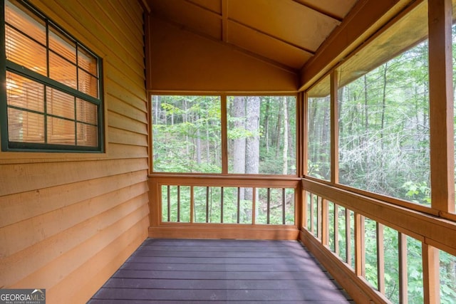 71 Cohutta Forest Rd Unit 9, Chatsworth, GA 30705 - unfurnished sunroom with vaulted ceiling, hardwood / wood-style flooring, and wooden walls