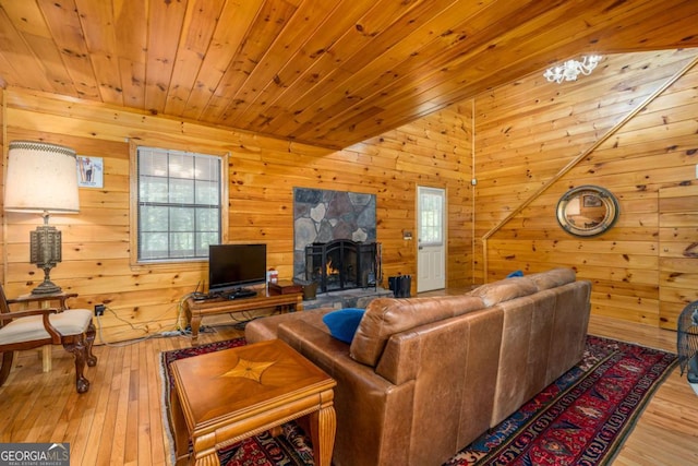 71 Cohutta Forest Rd Unit 9, Chatsworth, GA 30705 - living room featuring healthy amount of natural light, wood-type flooring, wooden walls, a fireplace, and wood ceiling