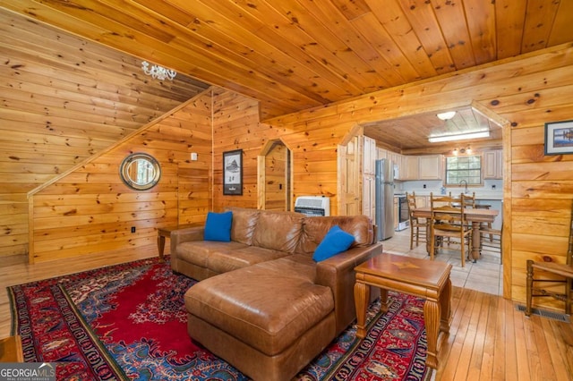 71 Cohutta Forest Rd Unit 9, Chatsworth, GA 30705 - living room with wooden ceiling, wood walls, and light wood-type flooring