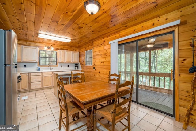 71 Cohutta Forest Rd Unit 9, Chatsworth, GA 30705 - dining area featuring light tile patterned flooring, wooden walls, and wooden ceiling