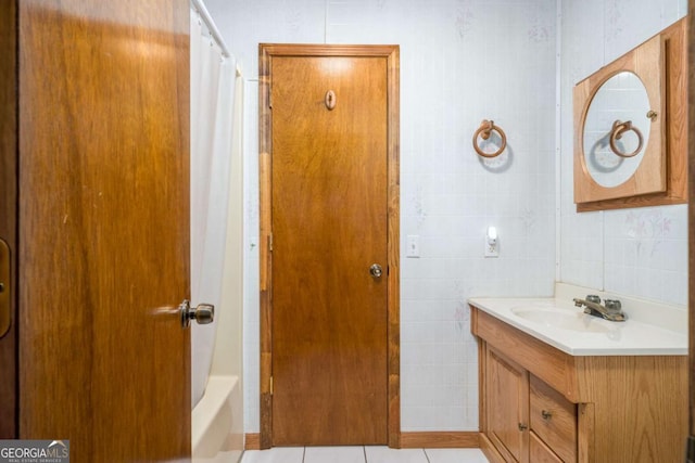 71 Cohutta Forest Rd Unit 9, Chatsworth, GA 30705 - bathroom with vanity, tile walls, tile patterned flooring, and shower / bath combo