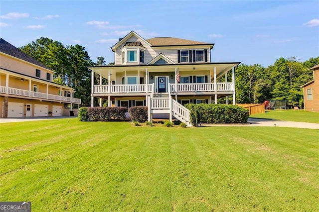 27 Riverview, Euharlee, GA 30145 - view of front of home featuring a front yard, stairway, covered porch, and a garage