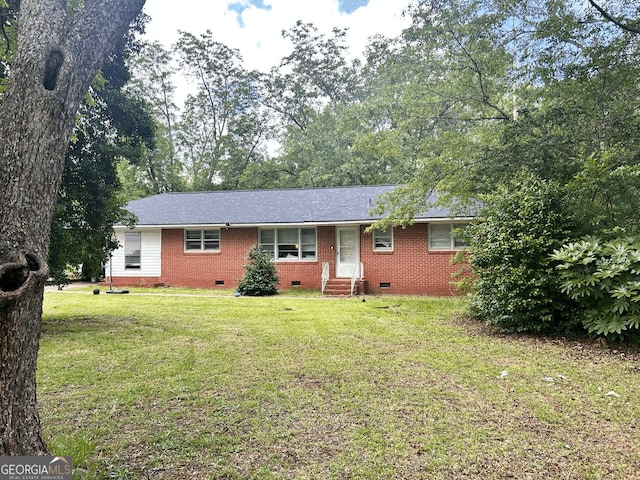 1106 Knoxville St, Fort Valley, GA 31030 - ranch-style house with crawl space, entry steps, brick siding, and a front lawn