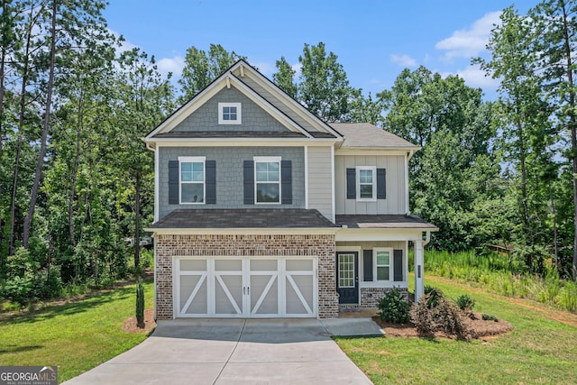 154 Laurel Cove Dr, Hoschton, GA 30548 - craftsman-style home featuring driveway, a front lawn, a garage, board and batten siding, and brick siding