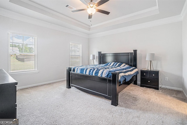 154 Laurel Cove Dr, Hoschton, GA 30548 - carpeted bedroom with a tray ceiling, multiple windows, crown molding, and ceiling fan