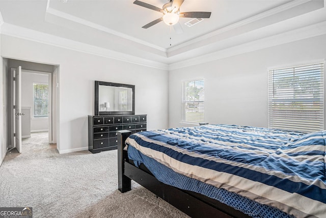 154 Laurel Cove Dr, Hoschton, GA 30548 - bedroom featuring a raised ceiling, carpet flooring, ornamental molding, and ceiling fan